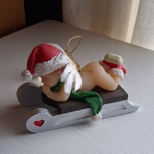 Festive Baby Angel Sleigh Ornament in Red and Green